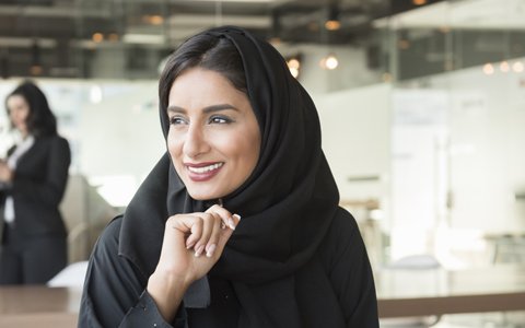 woman smiling to side