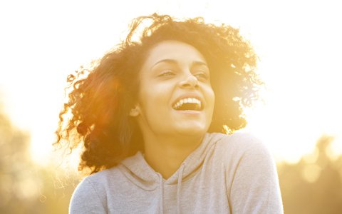 woman smiling brightly