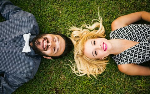 couple lying on lawn