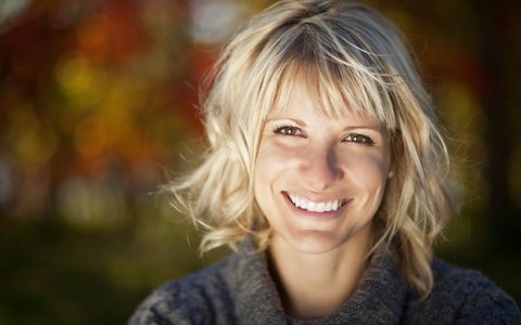 blonde woman smiling