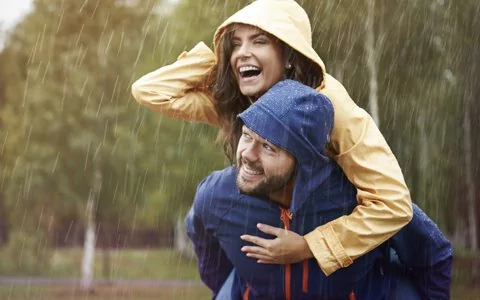 couple in raincoats