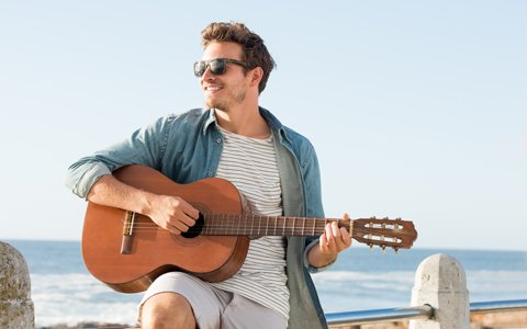 man playing guitar