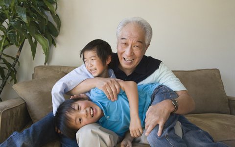 grandparent playing with children