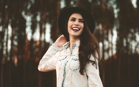 woman in hat with red lipstick